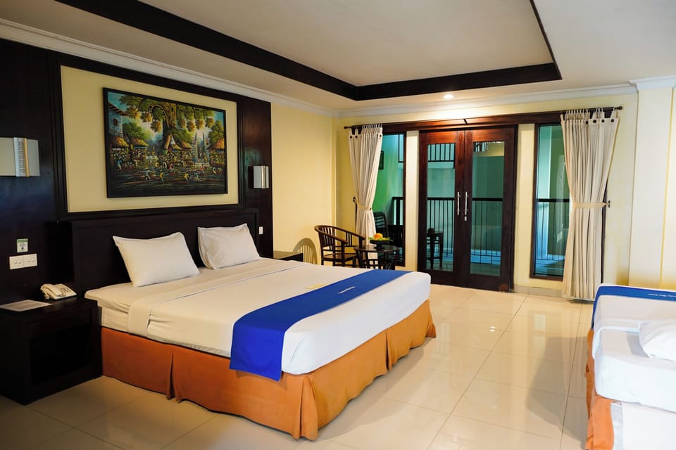 Quadruple Room with Balcony | Minibar, in-room safe, desk, free WiFi