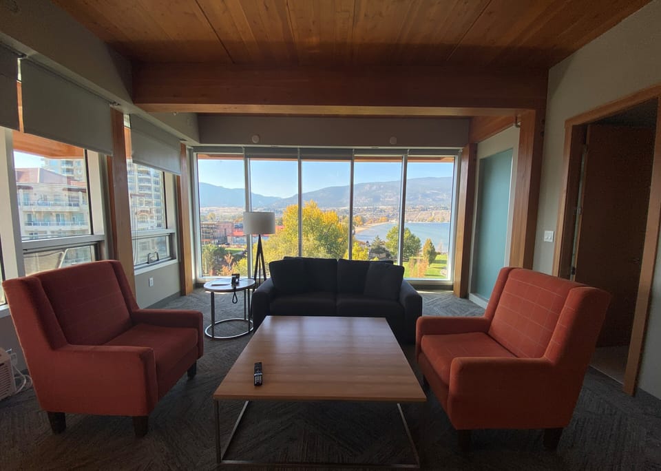 West Wing, Partial Lakeview Suite | Living room | 32-inch flat-screen TV with cable channels, TV