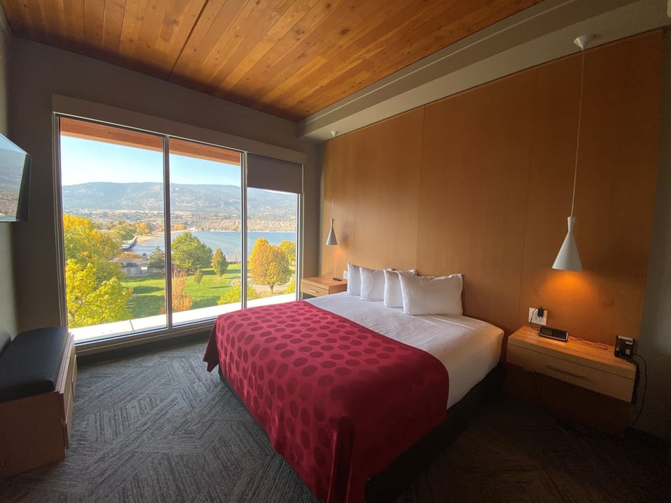 West Wing, Partial Lakeview Suite | Premium bedding, in-room safe, laptop workspace, blackout drapes