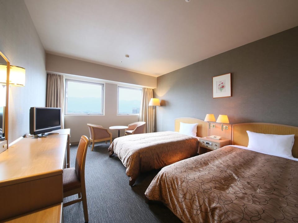 Desk, laptop workspace, free WiFi, bed sheets