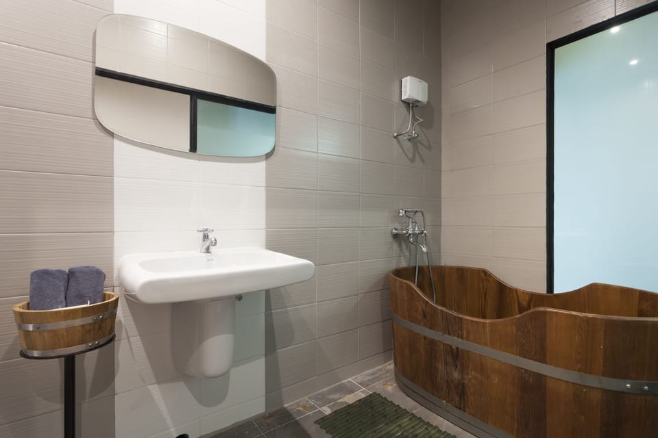 Designer toiletries, hair dryer, bathrobes, slippers