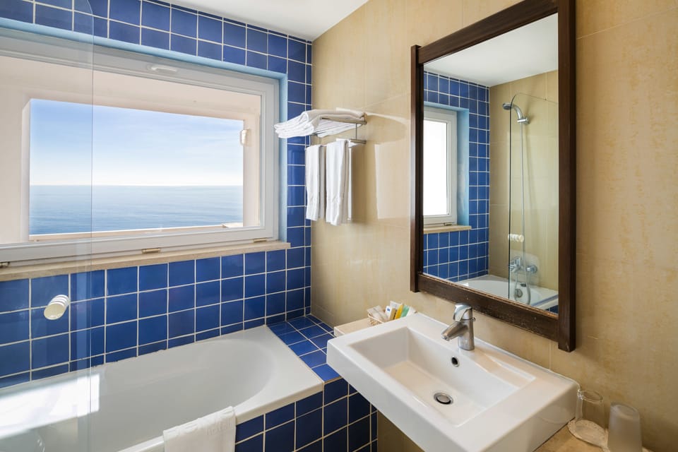 Double or Twin Room, Sea View | Bathroom | Combined shower/tub, free toiletries, hair dryer (on request), bathrobes