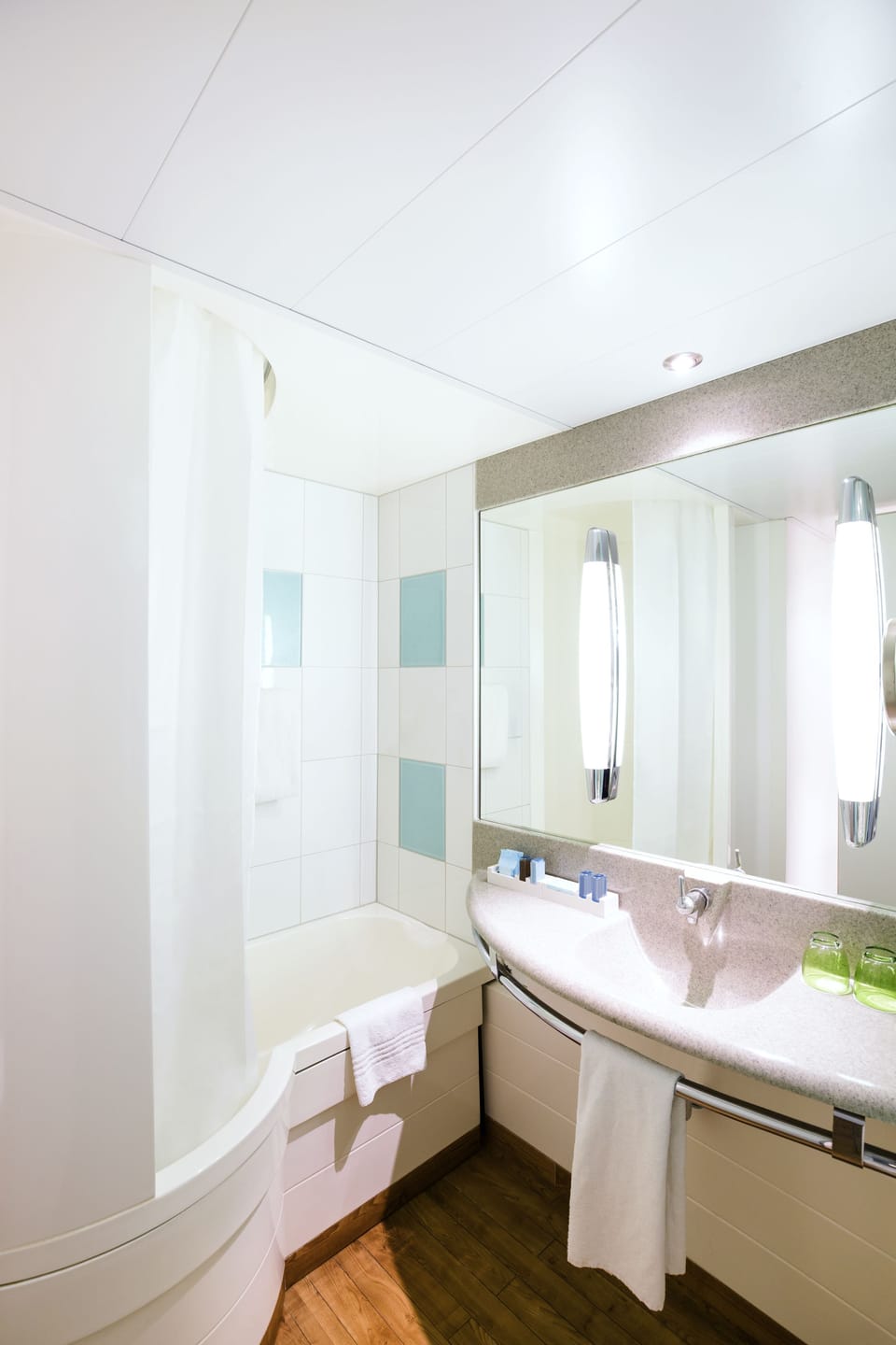 Eco-friendly toiletries, hair dryer, towels