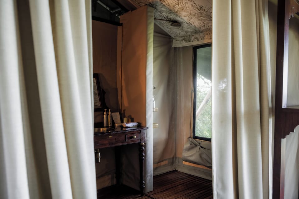 Luxury Tent | Bathroom | Shower, slippers, towels, toilet paper
