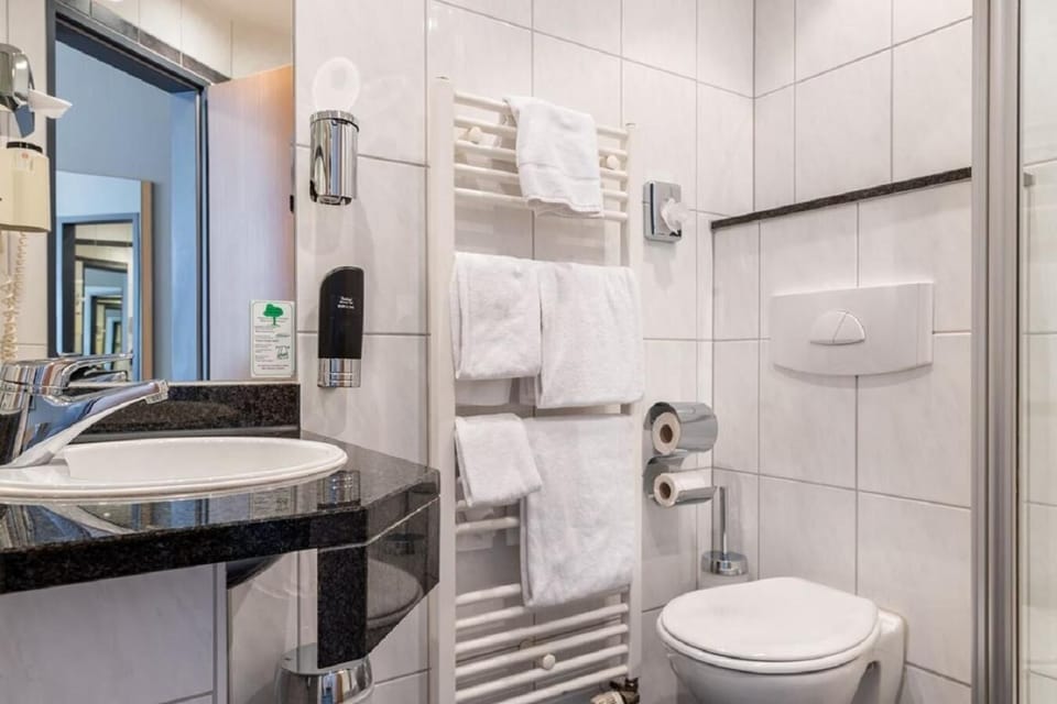 Shower, free toiletries, hair dryer, towels