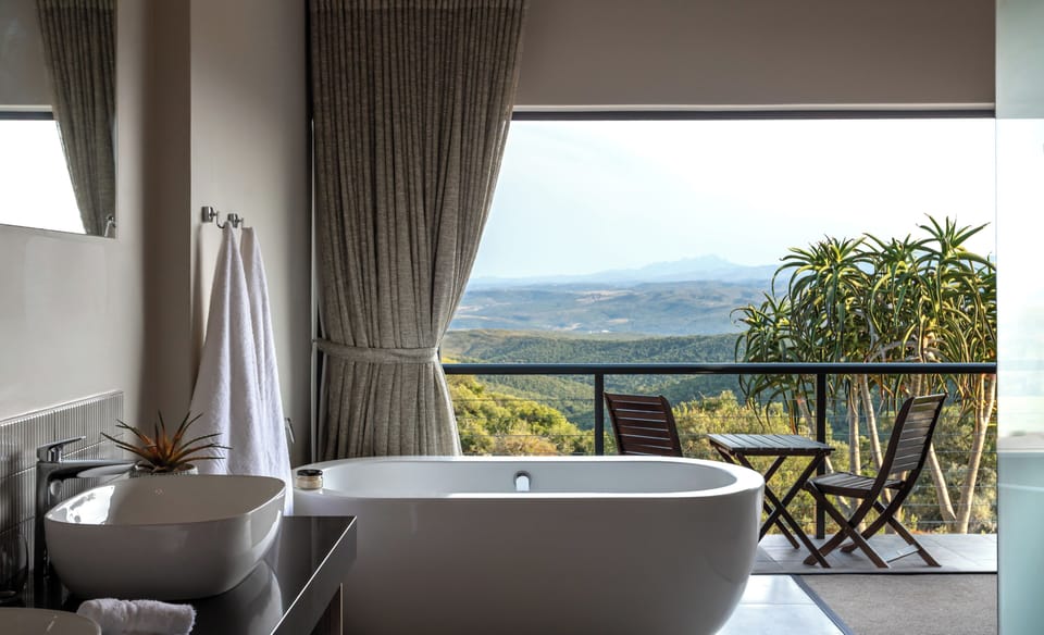 Luxury Suite, Mountain View | Bathroom | Shower, free toiletries, hair dryer, bathrobes