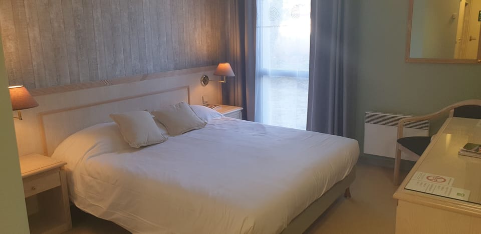Standard Double Room, Garden Area | Individually decorated, desk, laptop workspace, blackout drapes