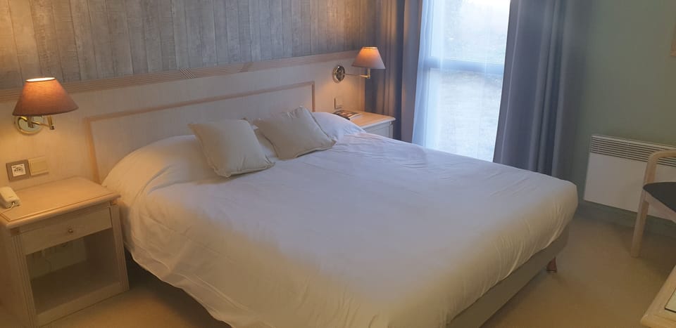 Standard Double Room, Garden Area | Individually decorated, desk, laptop workspace, blackout drapes
