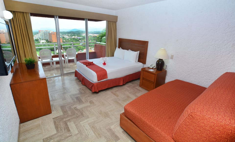Junior Room, Sea View (Club) | In-room safe, desk, iron/ironing board, free WiFi