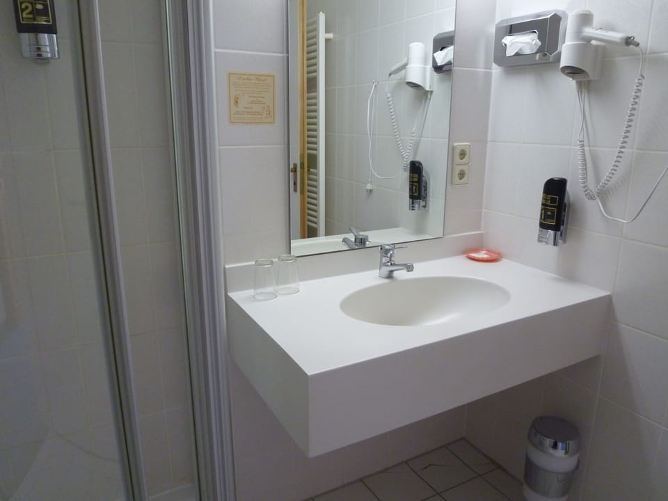 Shower, free toiletries, hair dryer, towels