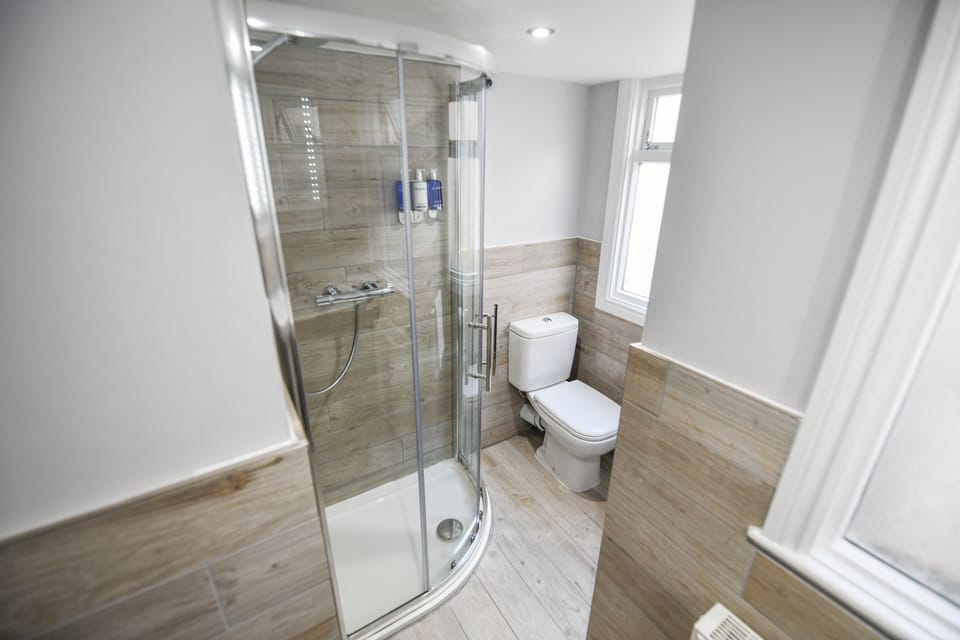 Superior Double Room | Bathroom | Eco-friendly toiletries, hair dryer, slippers, towels