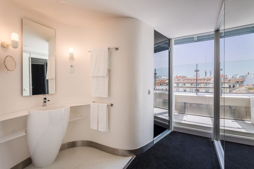 Eco-friendly toiletries, hair dryer, towels