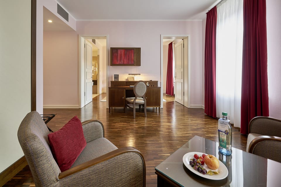 Junior Suite, 1 Bedroom, River View | Minibar, in-room safe, desk, blackout drapes