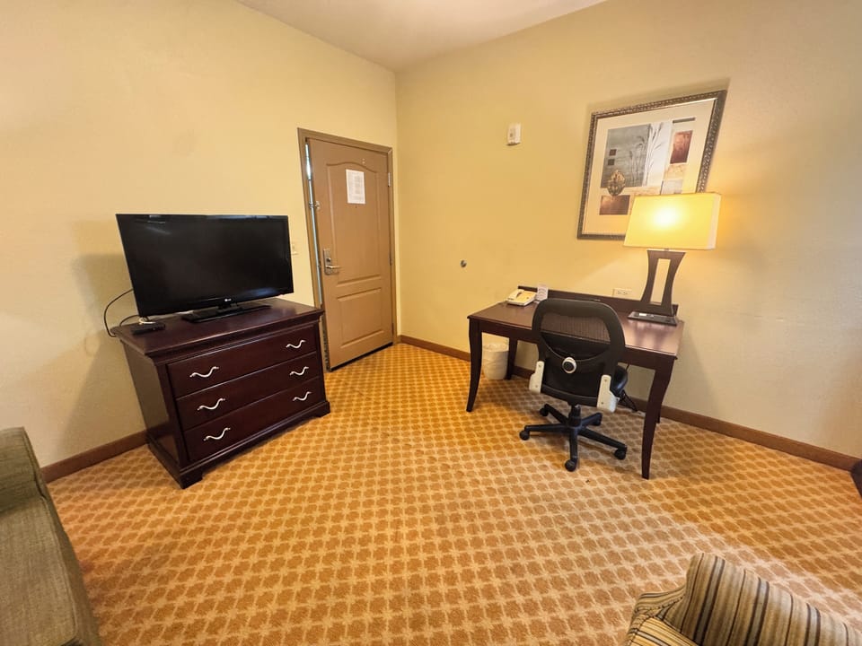 Suite, 1 King Bed with Sofa bed, Non Smoking | Premium bedding, in-room safe, desk, iron/ironing board