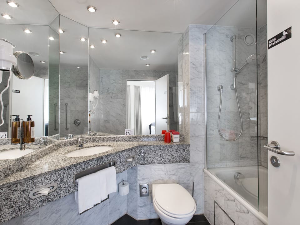 Combined shower/tub, deep soaking tub, free toiletries, hair dryer