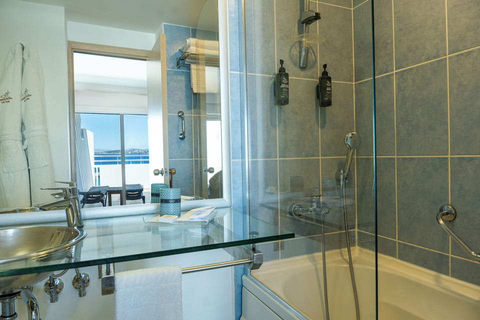 Hair dryer, bathrobes, slippers, towels