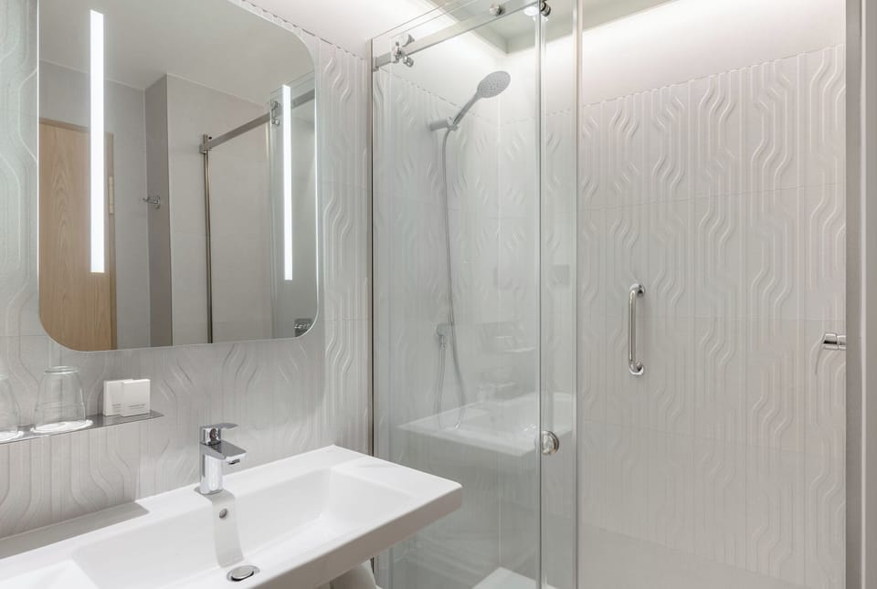 Eco-friendly toiletries, hair dryer, towels