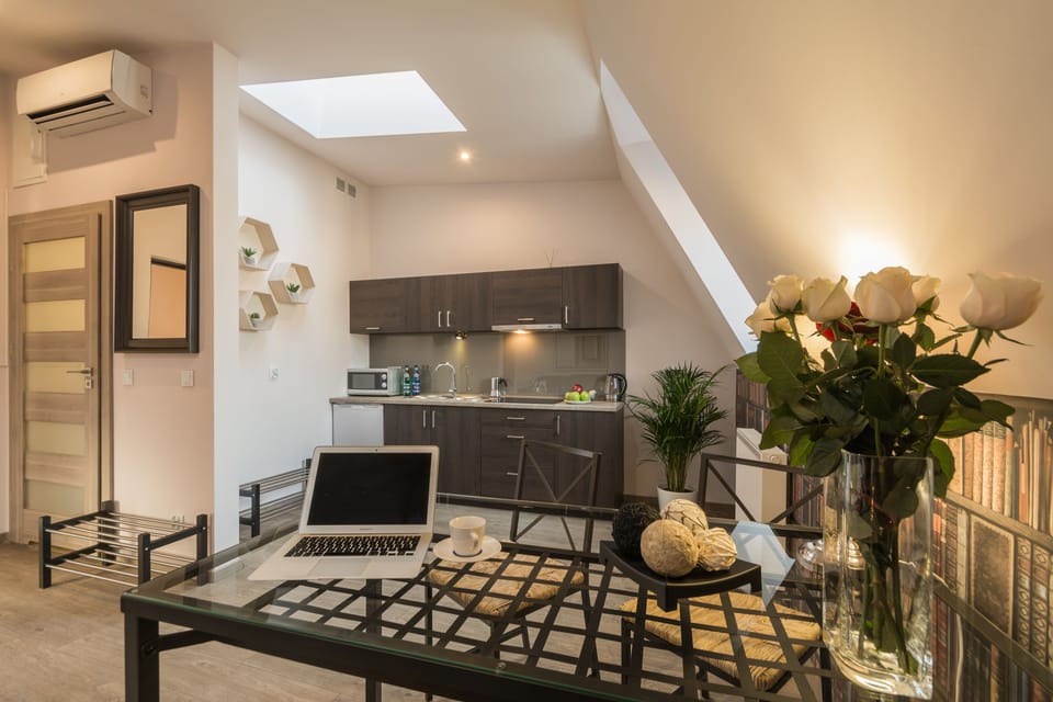 Exclusive Apartment, 1 Bedroom | Living area | Flat-screen TV