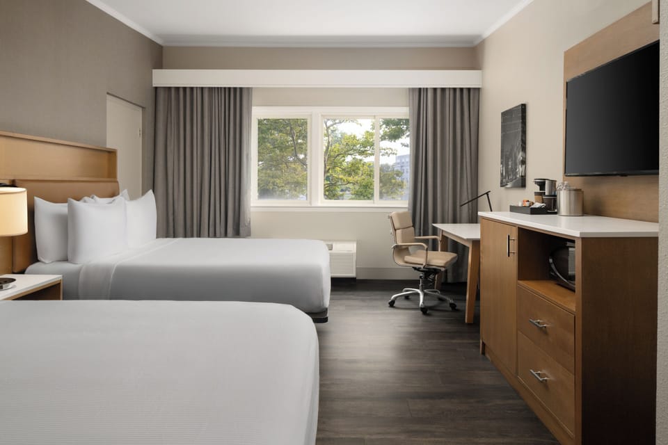 Hypo-allergenic bedding available, pillowtop beds, in-room safe, desk
