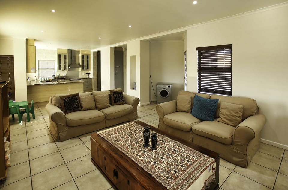 Comfort House, 4 Bedrooms (10 Mulligan ) | Living area | Flat-screen TV