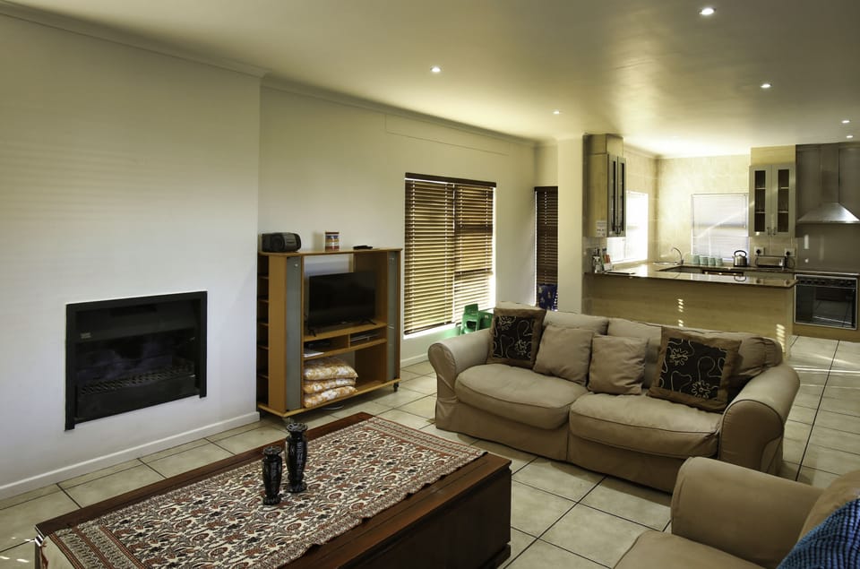 Comfort House, 4 Bedrooms (10 Mulligan ) | Living area | Flat-screen TV