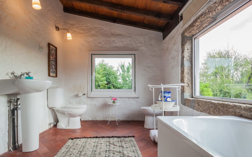 Rainfall showerhead, designer toiletries, hair dryer, towels