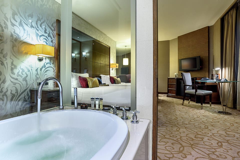 Presidential Suite, 2 Bedrooms | Bathroom | Separate tub and shower, spring water tub, eco-friendly toiletries
