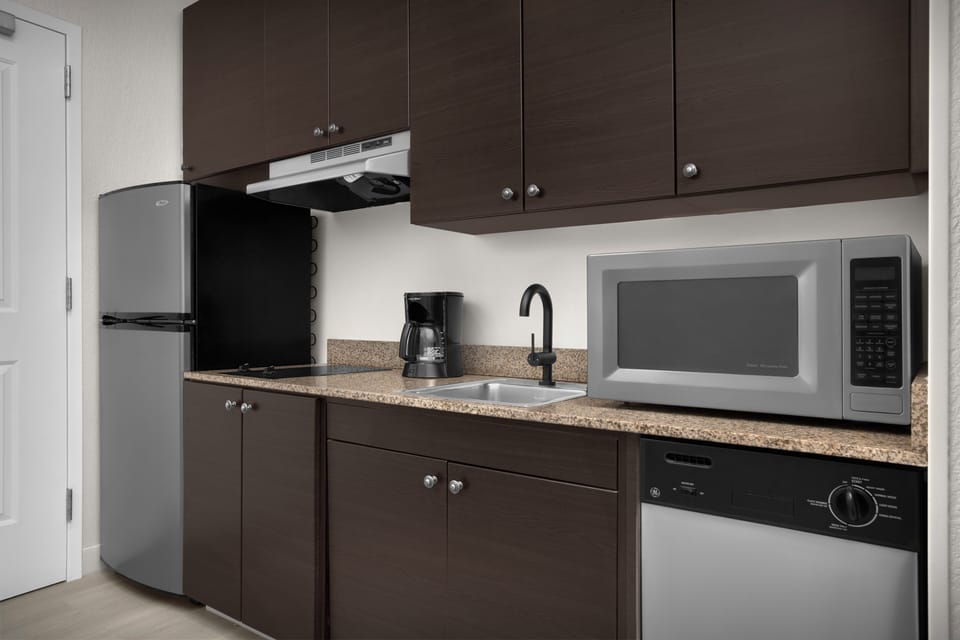 Studio, 1 King Bed with Sofa bed | Private kitchen | Coffee/tea maker, full-size fridge, microwave, stovetop