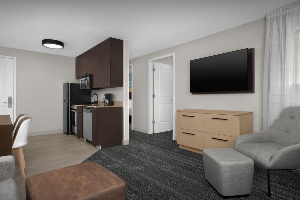 Suite, 2 Bedrooms | Living area | LCD TV, pay movies