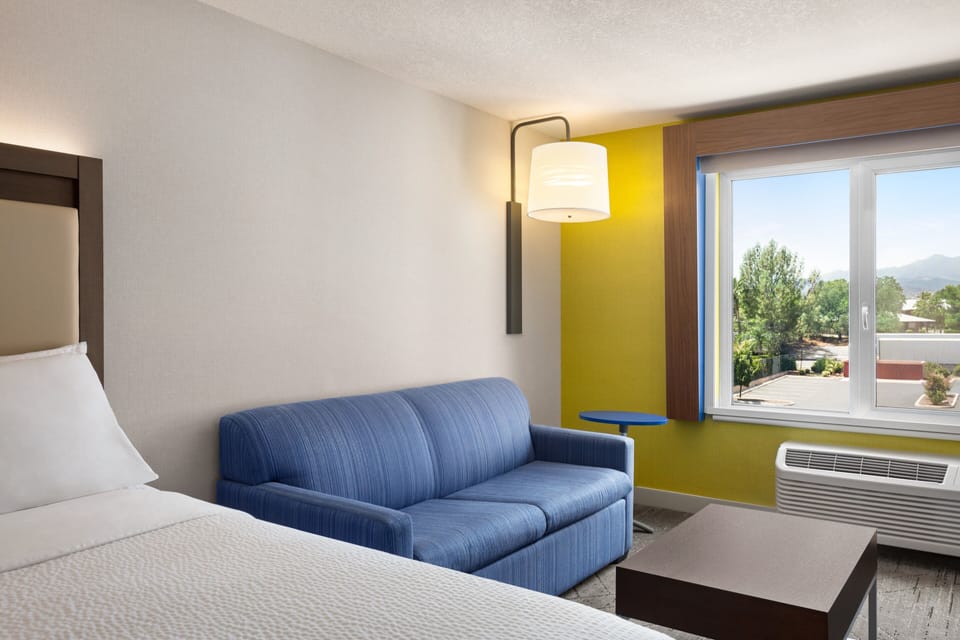 Suite, 2 Queen Beds | In-room safe, blackout drapes, iron/ironing board, WiFi (free)