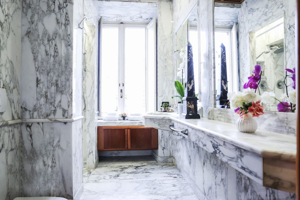 Deep soaking tub, rainfall showerhead, bathrobes, bidet
