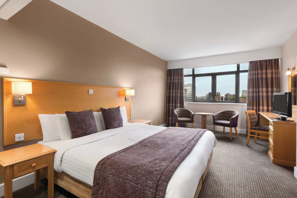 In-room safe, desk, iron/ironing board, free cribs/infant beds