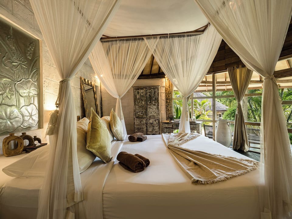 Pool Side Lodges | Minibar, in-room safe, individually decorated, blackout drapes