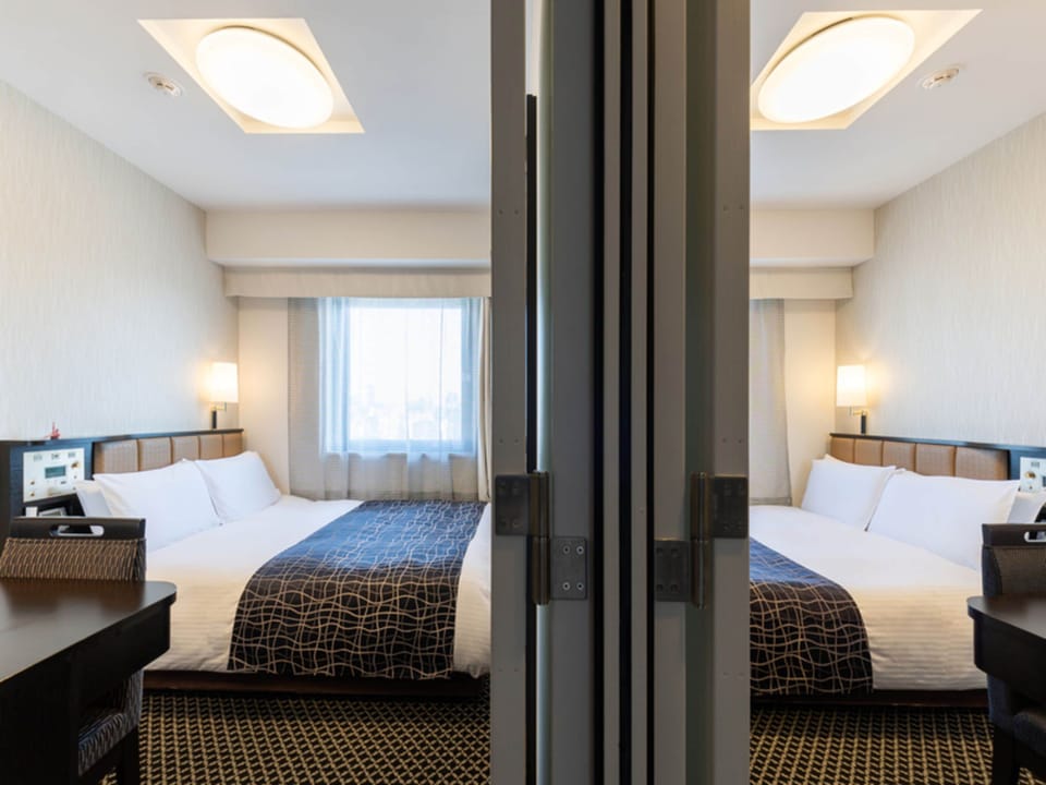 Premium bedding, down comforters, desk, laptop workspace