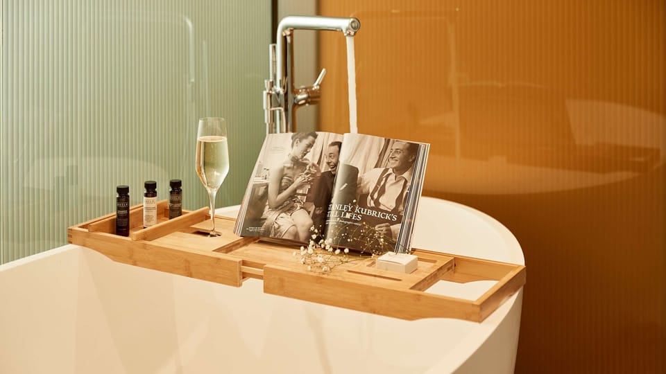 Junior Suite, 1 King Bed | Bathroom | Shower, free toiletries, hair dryer, towels