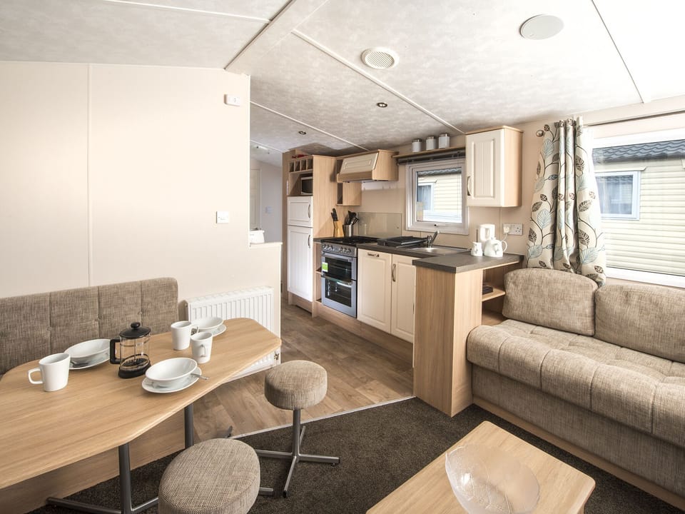 2 Bedroom Platinum Caravan | Private kitchen | Fridge, microwave, oven, stovetop