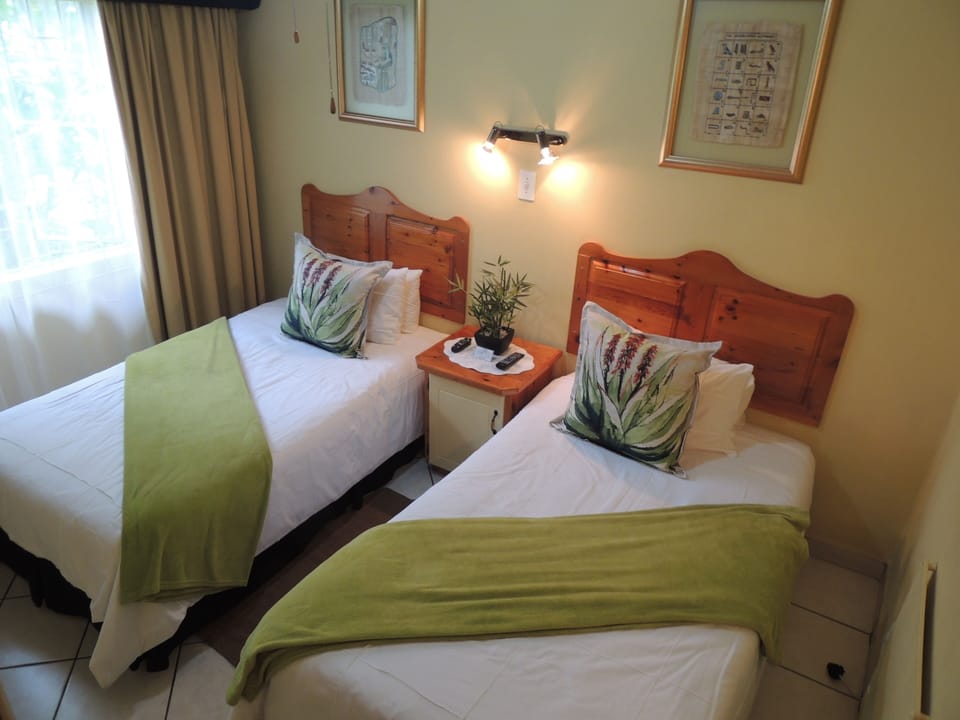 Comfort Quadruple Room | In-room safe, individually decorated, individually furnished, desk