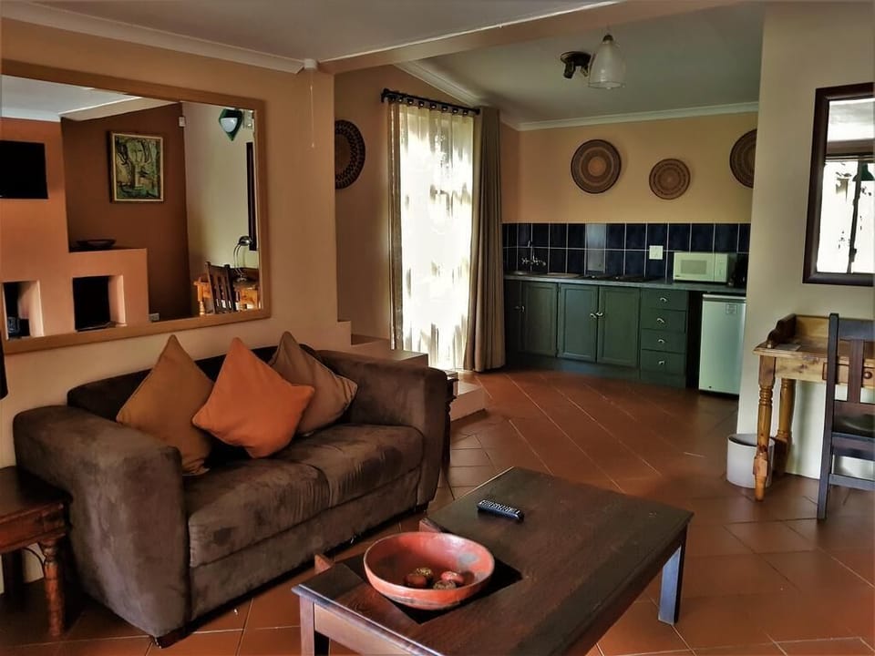 Premium Double Room | Living room | 54-cm LED TV with satellite channels, TV