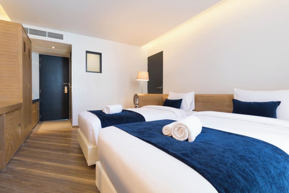 Deluxe Twin Room, 2 Twin Beds, Non Smoking | In-room safe, desk, rollaway beds, free WiFi