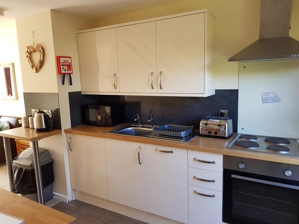 Fridge, microwave, electric kettle, toaster