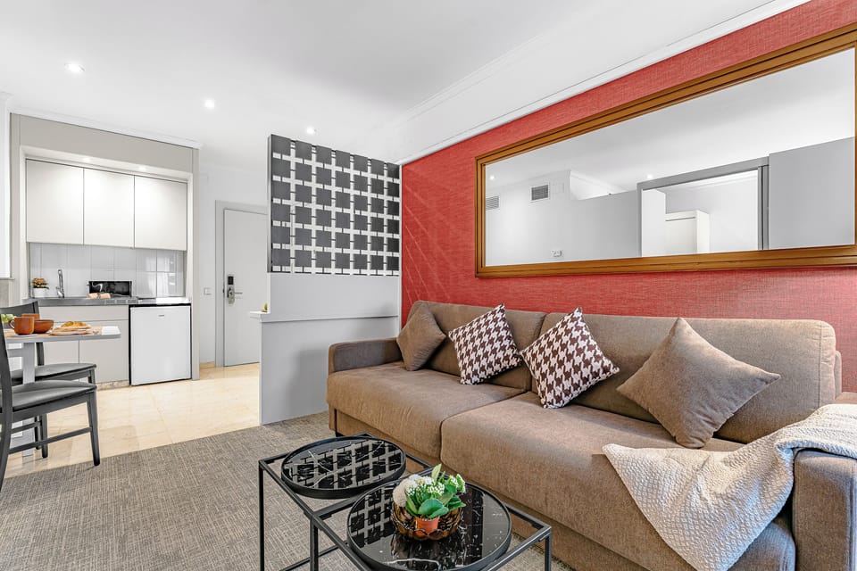 Superior Suite, Kitchenette | Living area | 26-inch flat-screen TV with satellite channels, TV