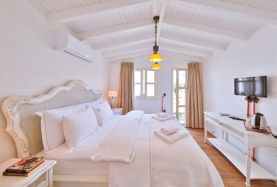 Bungalow Room | Premium bedding, in-room safe, desk, soundproofing