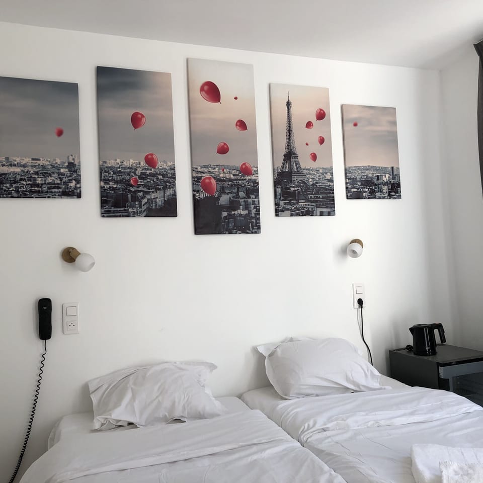 Twin Room | Minibar, in-room safe, soundproofing, free WiFi