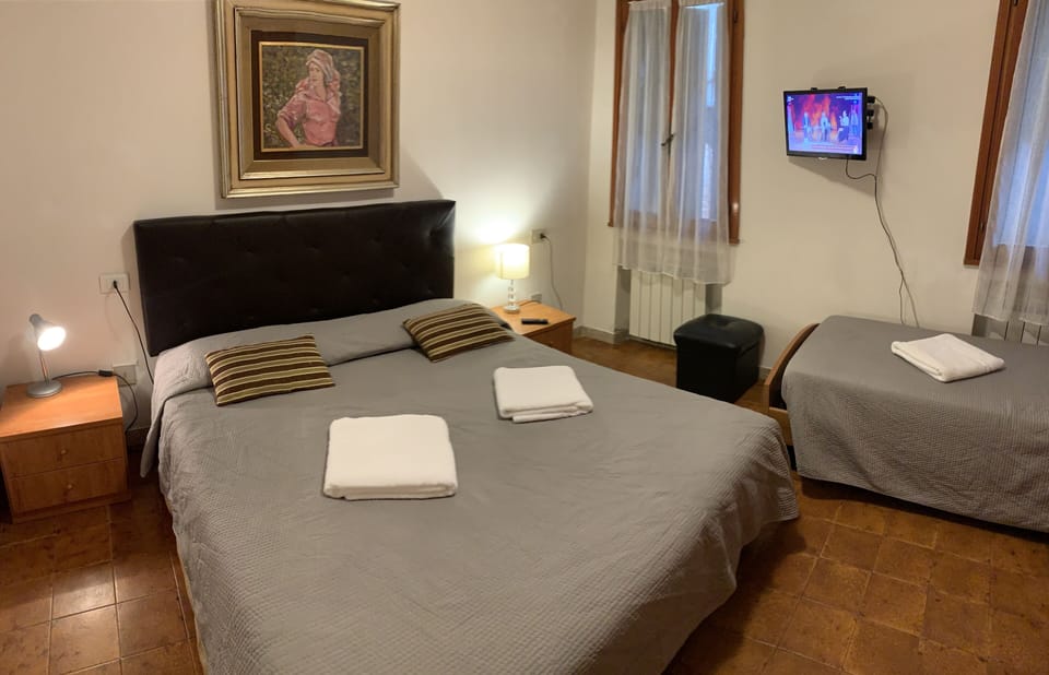 Premium bedding, blackout drapes, soundproofing, free WiFi