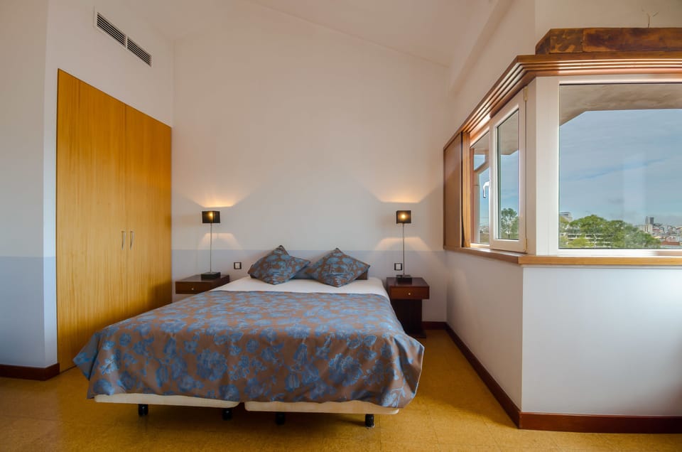 Suite, 1 Queen Bed, City View | Minibar, in-room safe, individually decorated, individually furnished