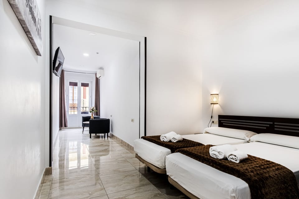 Deluxe Room, 2 Twin Beds, Private Bathroom, City View | Blackout drapes, soundproofing, free cribs/infant beds, free WiFi