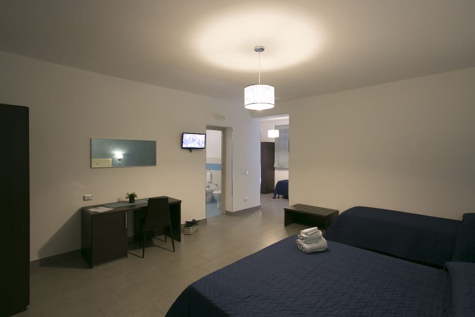 Panoramic Quadruple Room, Balcony | Free minibar items, desk, soundproofing, cribs/infant beds
