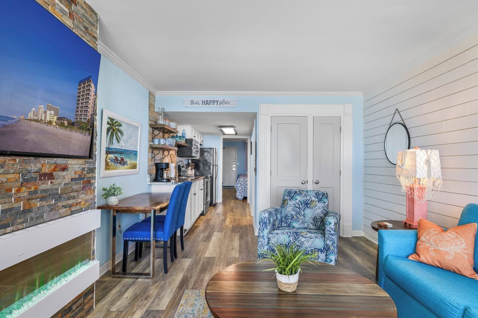 Deluxe Condo, 1 Bedroom, Ocean View, Oceanfront (1005) | Living area | TV, DVD player