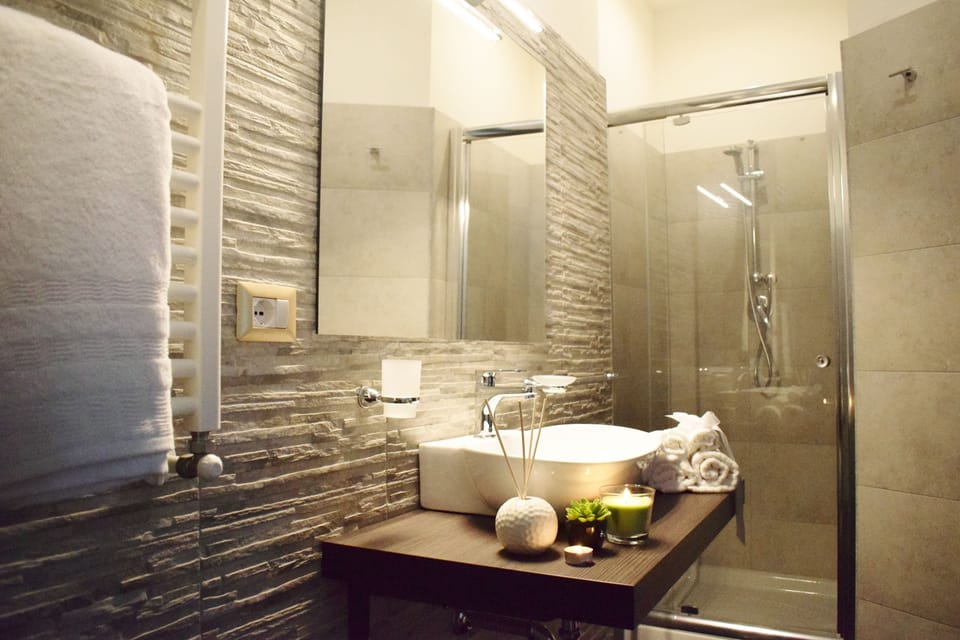 Superior Triple Room, Balcony, Mountain View (204 Specchiera) | Bathroom | Shower, free toiletries, hair dryer, bidet
