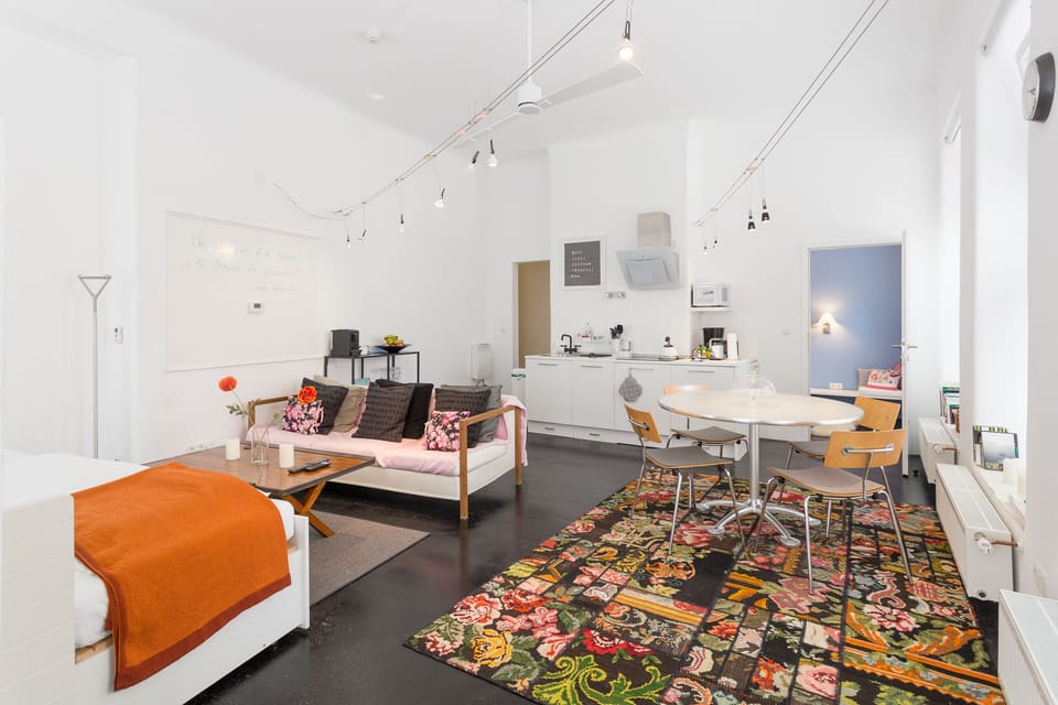 Premium Apartment, 1 Bedroom, Kitchen (final cleaning fee included) | Living area | Smart TV, books, first-run movies